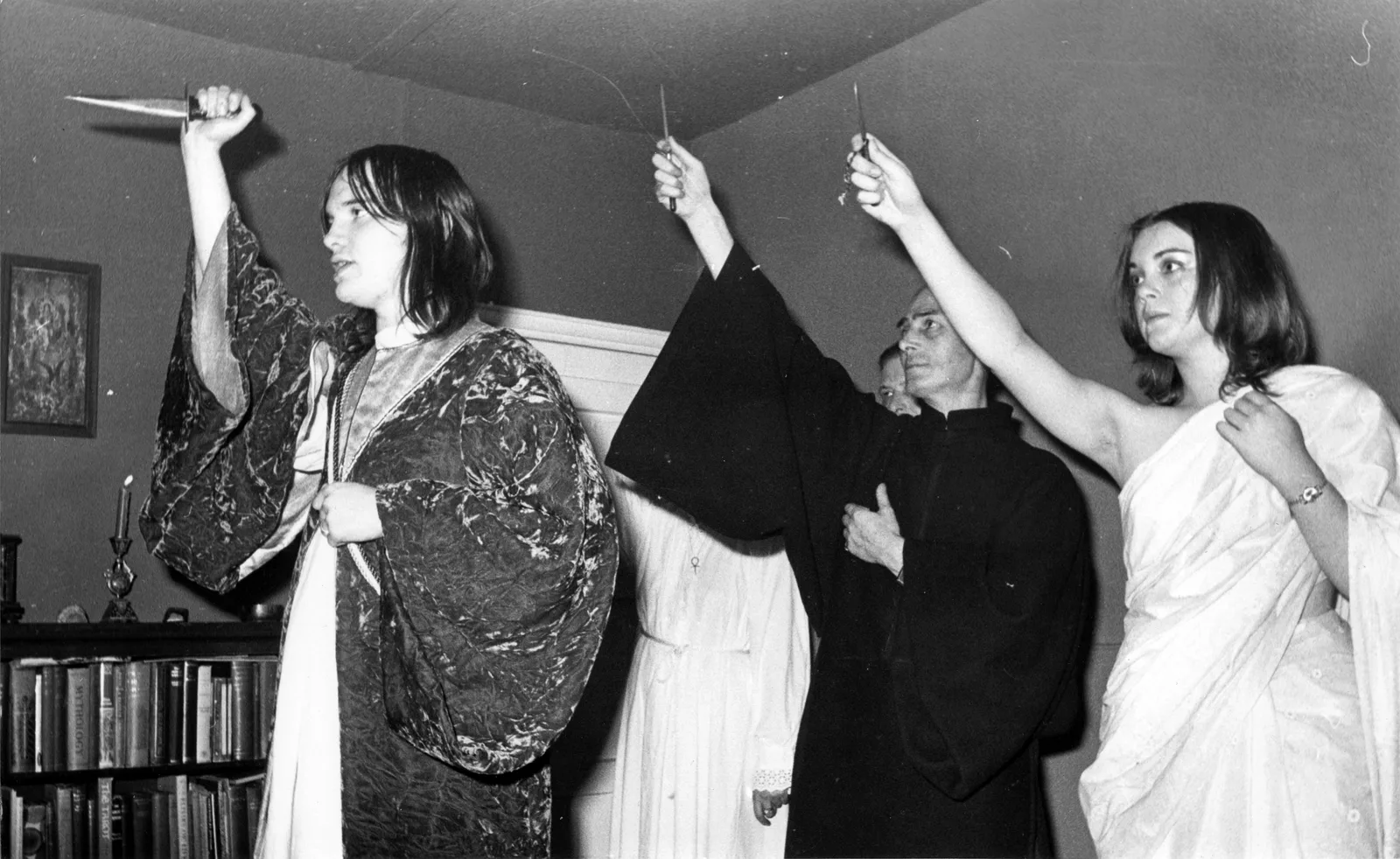 The coven raising their daggers, Chantry Cottage, published 8 November 1973