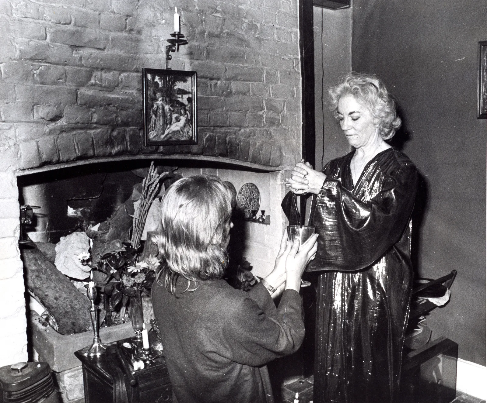Betty Britton lowering the dagger into the cup, Chantry Cottage, 2 July 1974