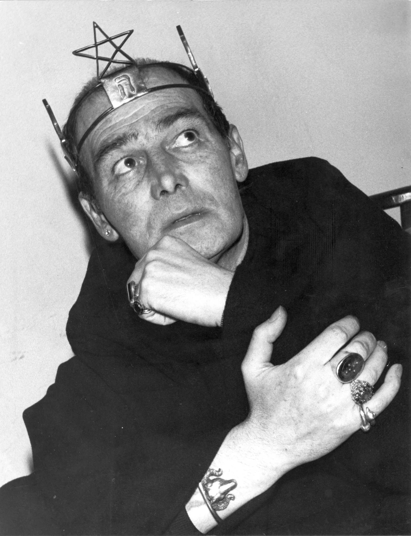 Alex Sanders wearing the pentacle crown, Chantry Cottage, 23 April 1975