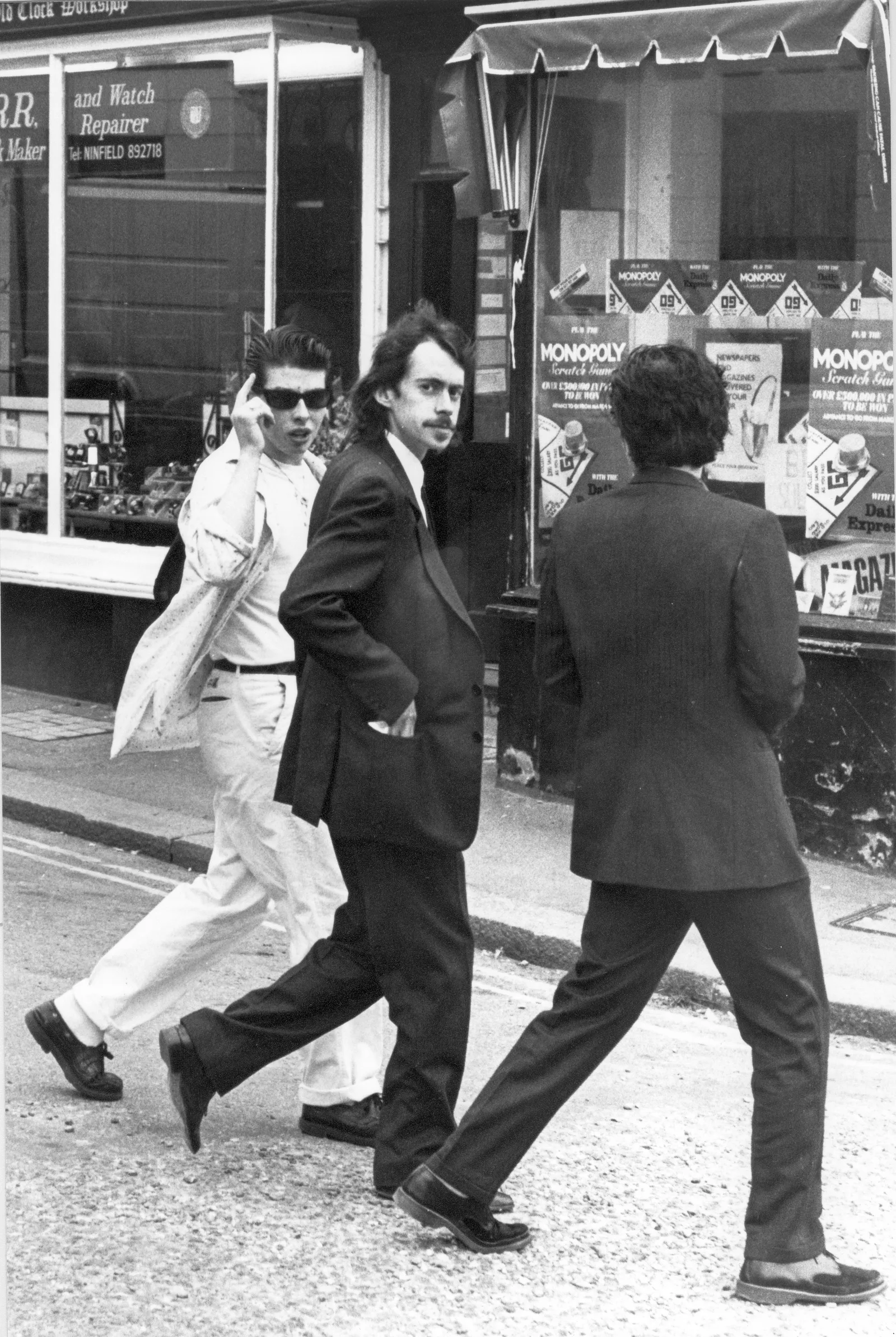 Victor Sanders with two companions crossing the street, Bexhill Old Town, 19 May 1988