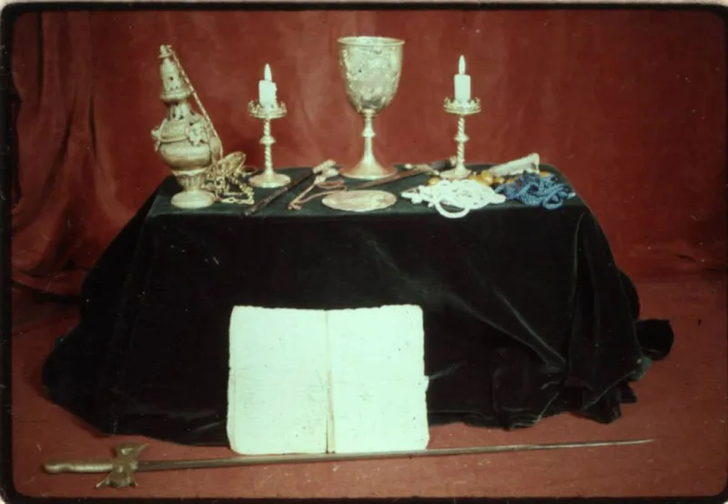 Images of Alex and Maxine Sanders with Tarot cards plus other ritual items
