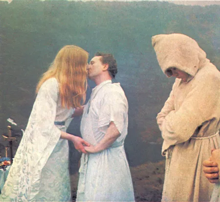 Maxine Sanders kissing a follower during winter ceremony