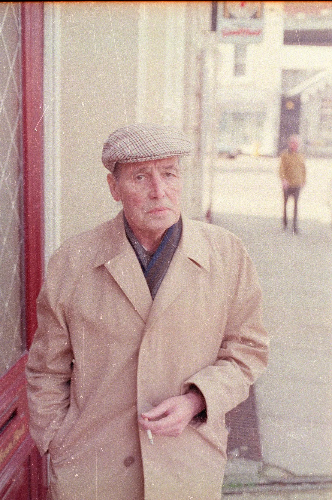 Photo: Alex Sanders in Flat-cap and overcoat