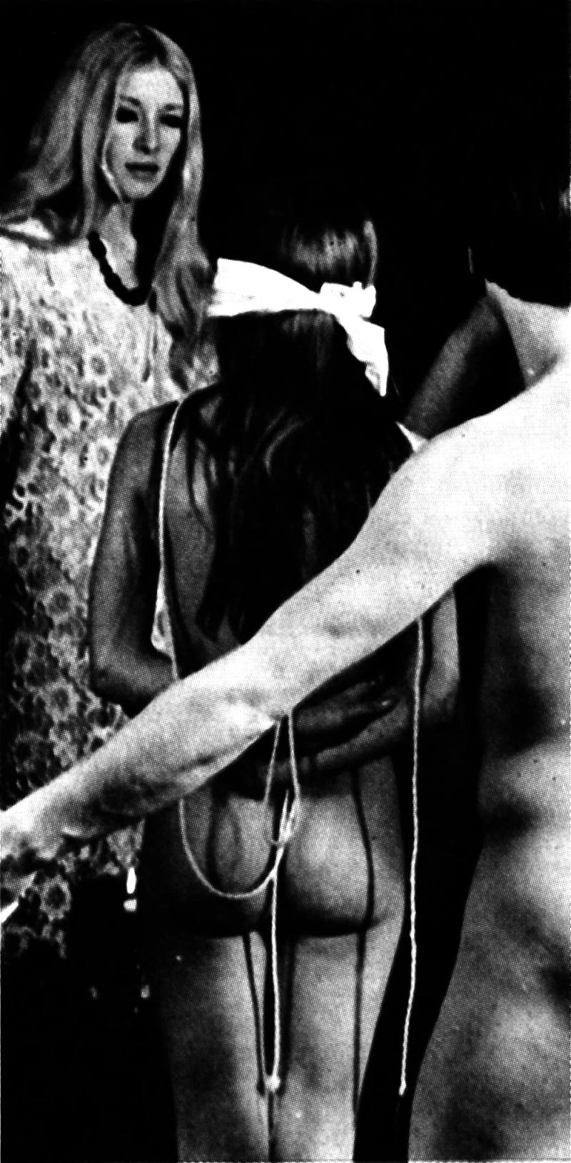 Photograph of Maxine Sanders initiating Janet Owen (Janet Farrar)